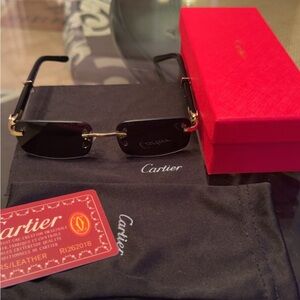 Cartier Black and Gold Rimless Sunglasses